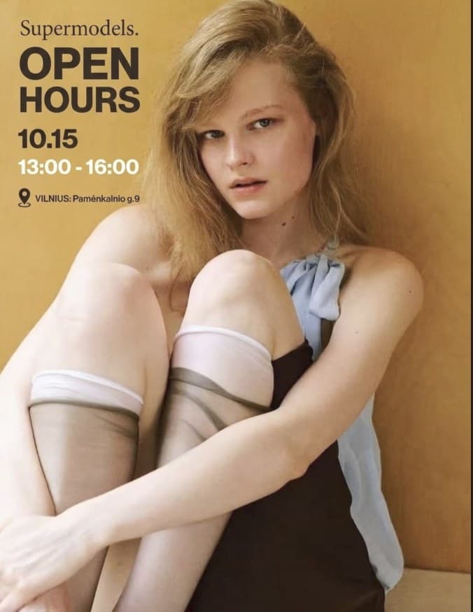 Supermodels open hours poster: a young model sitting with her arms around her knees
