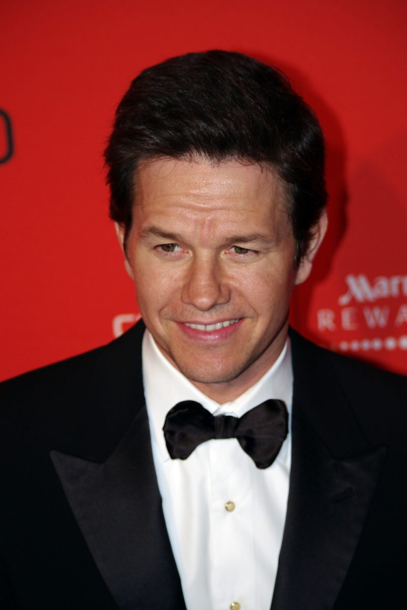 Mark Wahlberg in a black tuxedo and bow tie at a gala in 2011