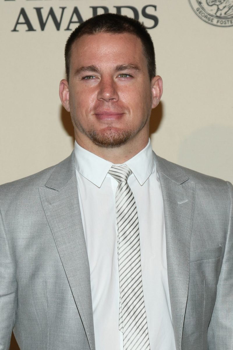Channing Tatum at the Peabody Awards, 2012 Channing Tatum in a light grey suit, white shirt and striped tie at the Peabody Awards luncheon in 2012