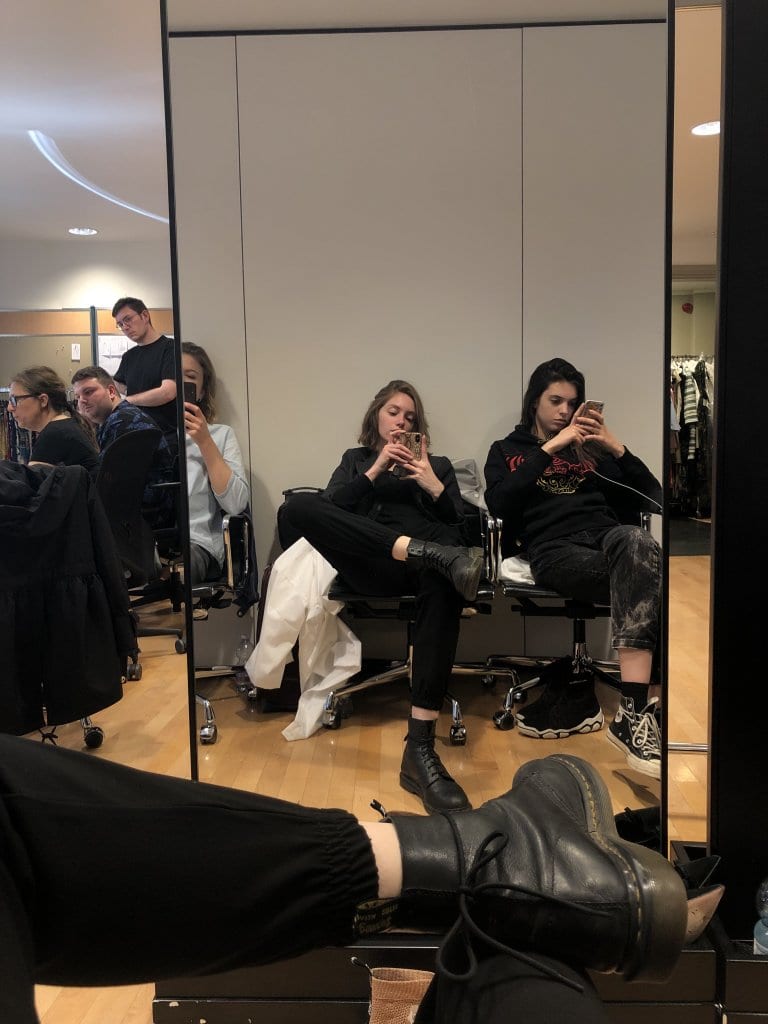 Models waiting for their turn at a fitting