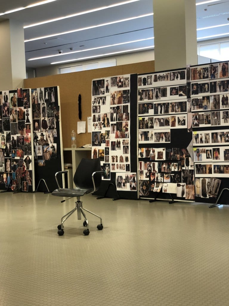 A board of model cards in the casting and fitting room